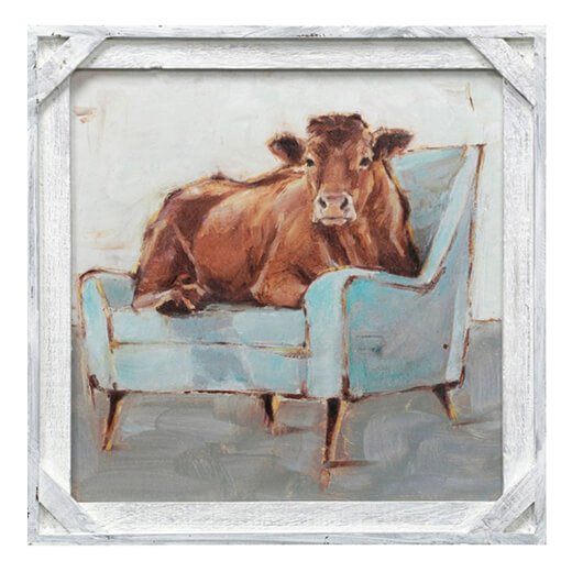 Cow in chair